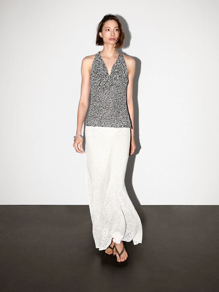 Top drapé en maille chinée