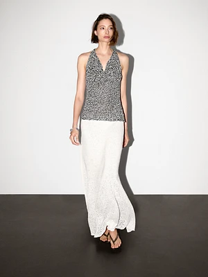 Top drapé en maille chinée