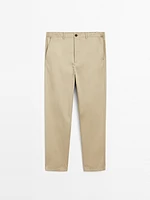 Trousers with patch pocket