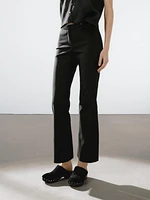 Flared trousers with waist detail
