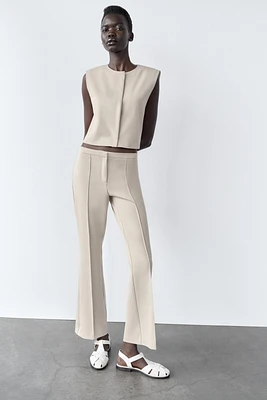 CROPPED VEST WITH HIDDEN BUTTONS