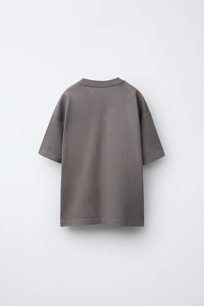 T-SHIRT À IMPRIMÉ GRAFFITI