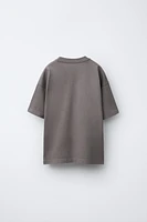 T-SHIRT À IMPRIMÉ GRAFFITI