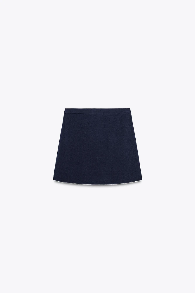MINI KNIT SKIRT WITH PIPING