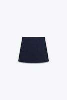 MINI KNIT SKIRT WITH PIPING