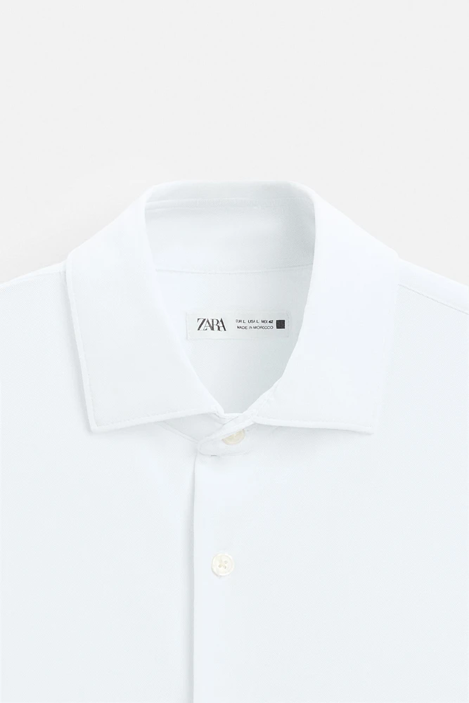 CHEMISE ÉLASTIQUE TEXTURÉE