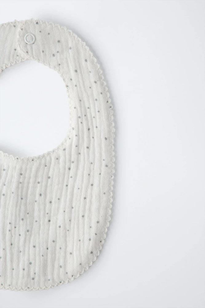 TEXTURED WEAVE BIB WITH STARS