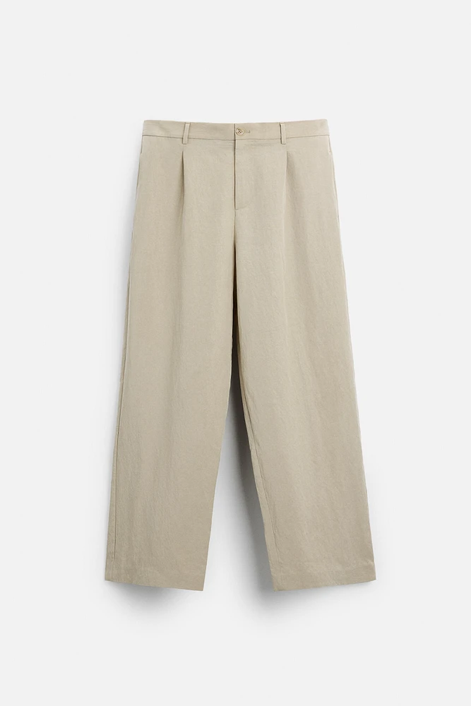 PANTALON COUPE LARGE À PLIS