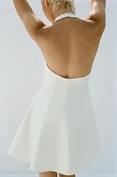 ROBE COURTE HALTER GODETS