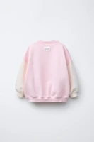 SWEATSHIRT WITH RAISED TEXT PRINT