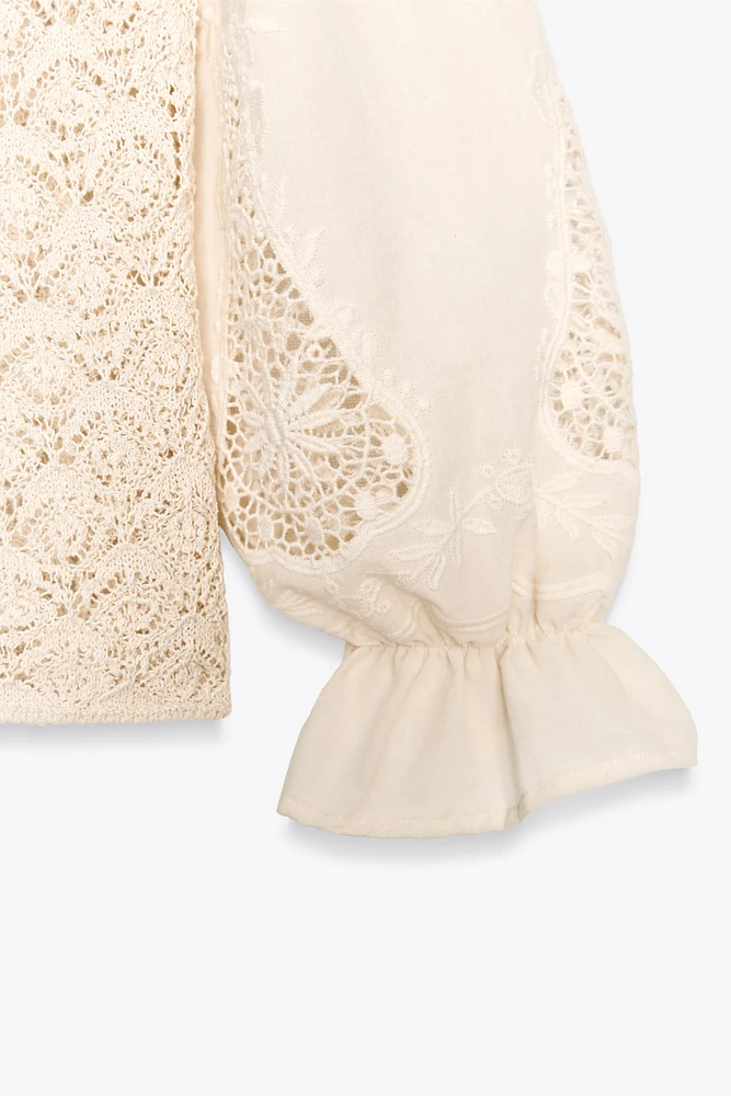 POINTELLE KNIT SWEATER WITH CONTRASTING SLEEVES