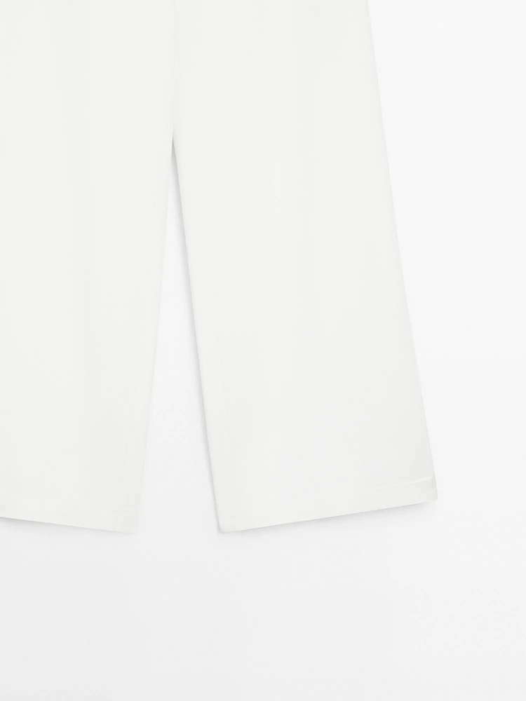 High-waist palazzo trousers - STUDIO