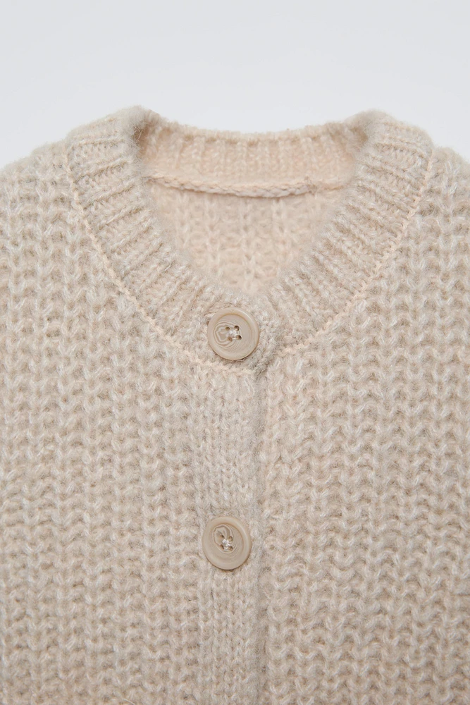 GILET SANS MANCHES EN MAILLE ÉPAISSE