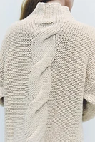PULL EN MAILLE À TORSADES