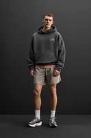 SWEAT À CAPUCHE IMPRIMÉ