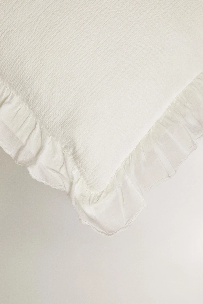 HOUSSE DE COUSSIN TEXTURE VOLANT