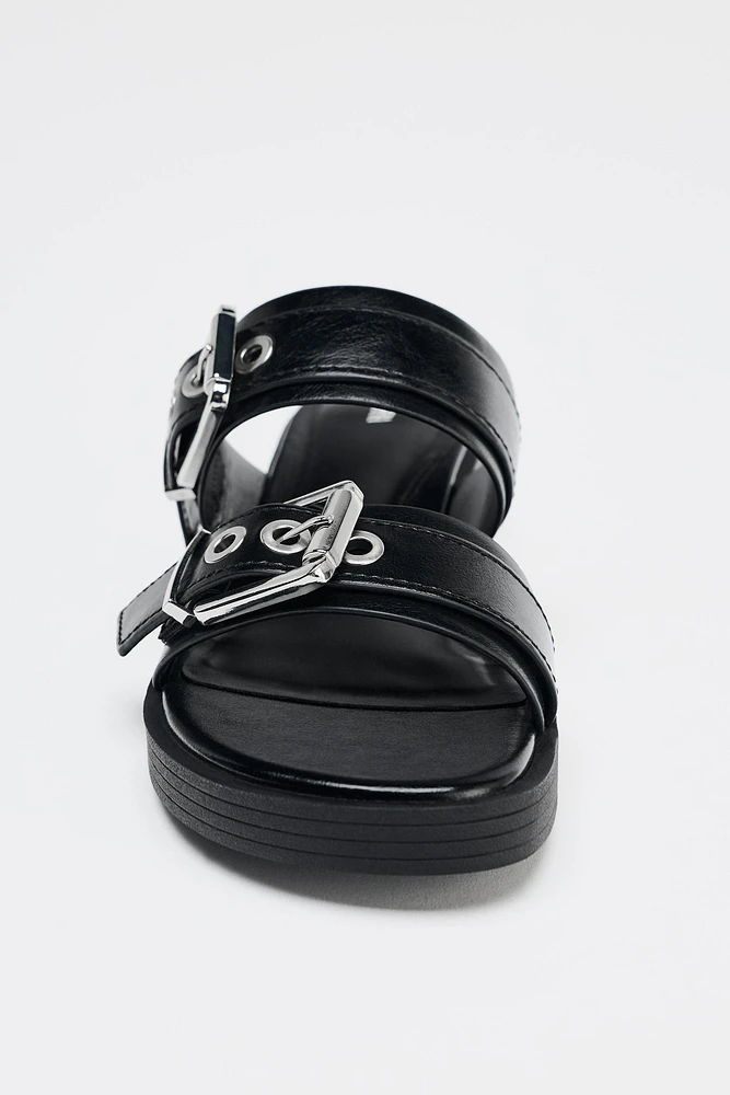 FLAT BUCKLED SANDALS