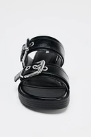 FLAT BUCKLED SANDALS