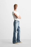RIPPED FLARE FIT JEANS