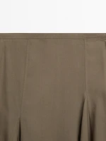 Asymmetric flounce midi skirt