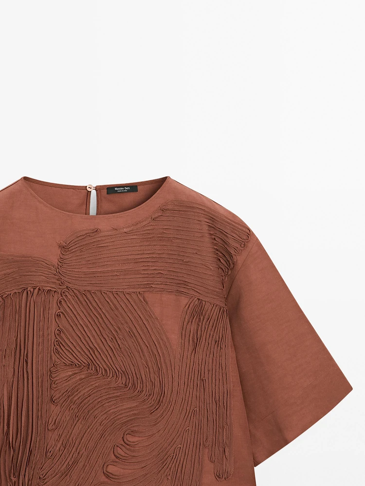 Flowing top with embroidered detail