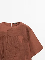 Flowing top with embroidered detail