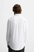 CHEMISE ÉLASTIQUE TEXTURÉE