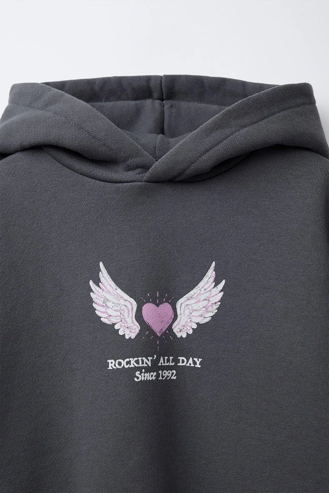 SWEAT À CAPUCHE IMPRIMÉ
