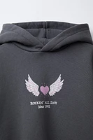 SWEAT À CAPUCHE IMPRIMÉ