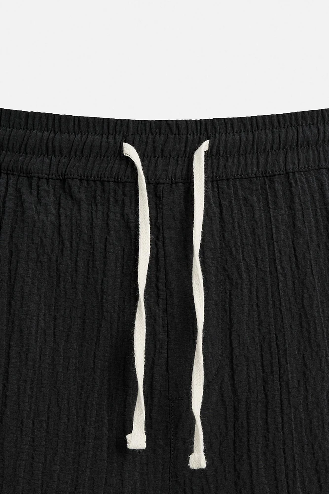 WRINKLED EFFECT JACQUARD BERMUDA SHORTS