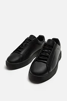 BASKETS EN CUIR
