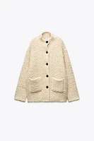 MANTEAU EN MAILLE À COL MONTANT