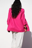VESTE À MANCHES RETROUSSÉES