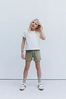 SHORT EN JEAN À CLOUS ÉTOILES