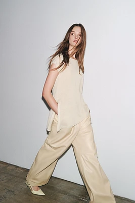 ASYMMETRIC HEM KNIT TOP