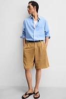 PLEATED SUEDE SHORTS