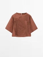 Flowing top with embroidered detail
