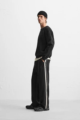 TECHNICAL PANTS WITH BANDS