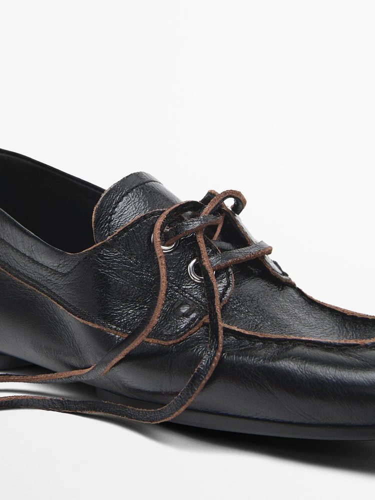 Shiny leather deck shoes