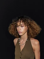 Veste sans manches en maille à encolure américaine