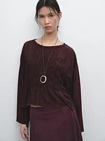 Flowing blouse with gathered detail