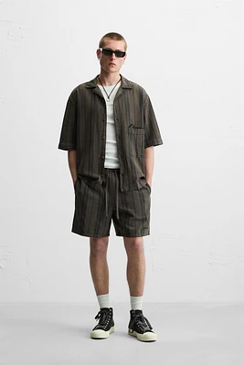 TEXTURED EMBROIDERED SHORTS