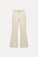 FLARE INTERLOCK PANTS WITH SEAMS
