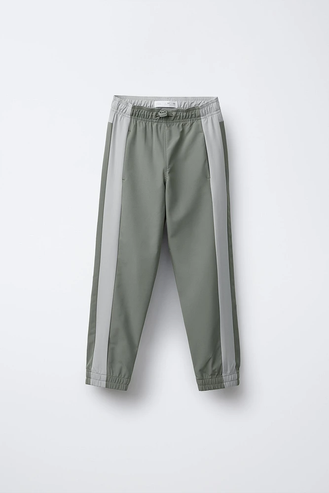 TECHNICAL JOGGER PANTS WITH SIDE STRIPE