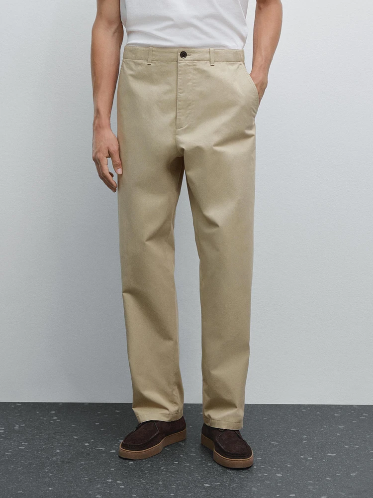 Trousers with patch pocket