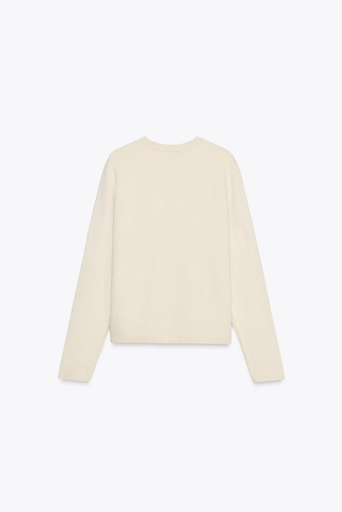 GILET EN MAILLE AVEC POCHES