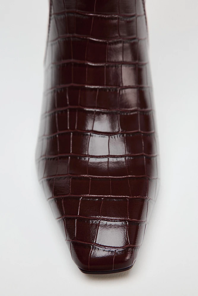 THIN HEEL EMBOSSED BOOTS