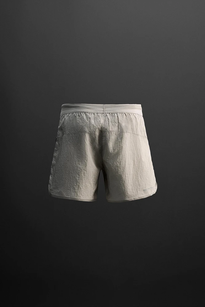 STRUCTURED RUNNING SHORTS
