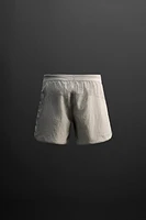 STRUCTURED RUNNING SHORTS