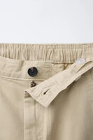 PANTALON COUPE CAROTTE À POCHES